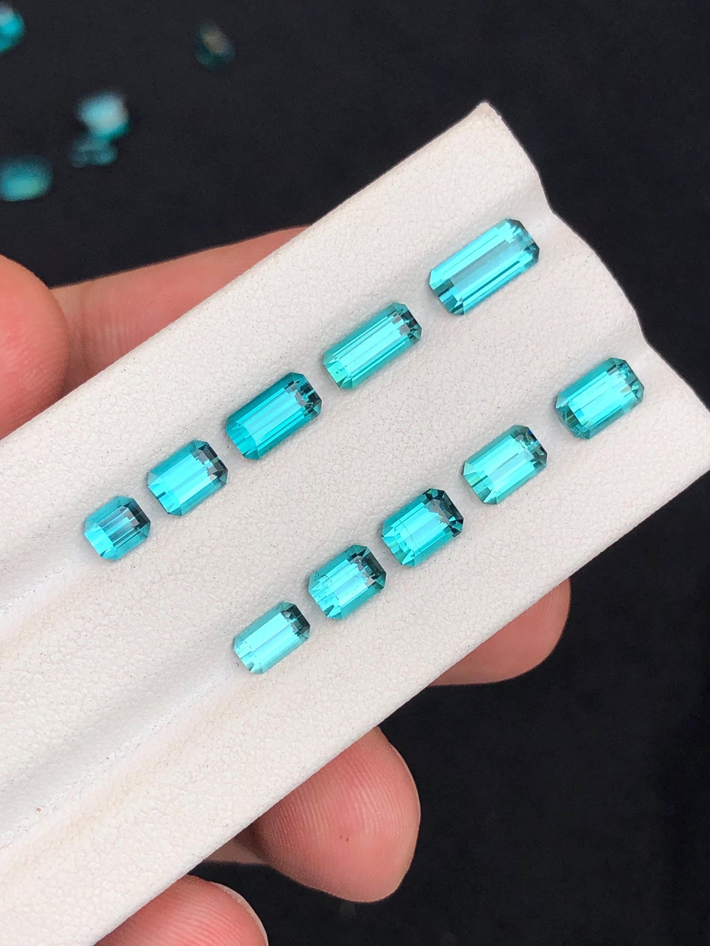 6.30 ct faceted neon blue tourmalines 4mm to 9mm