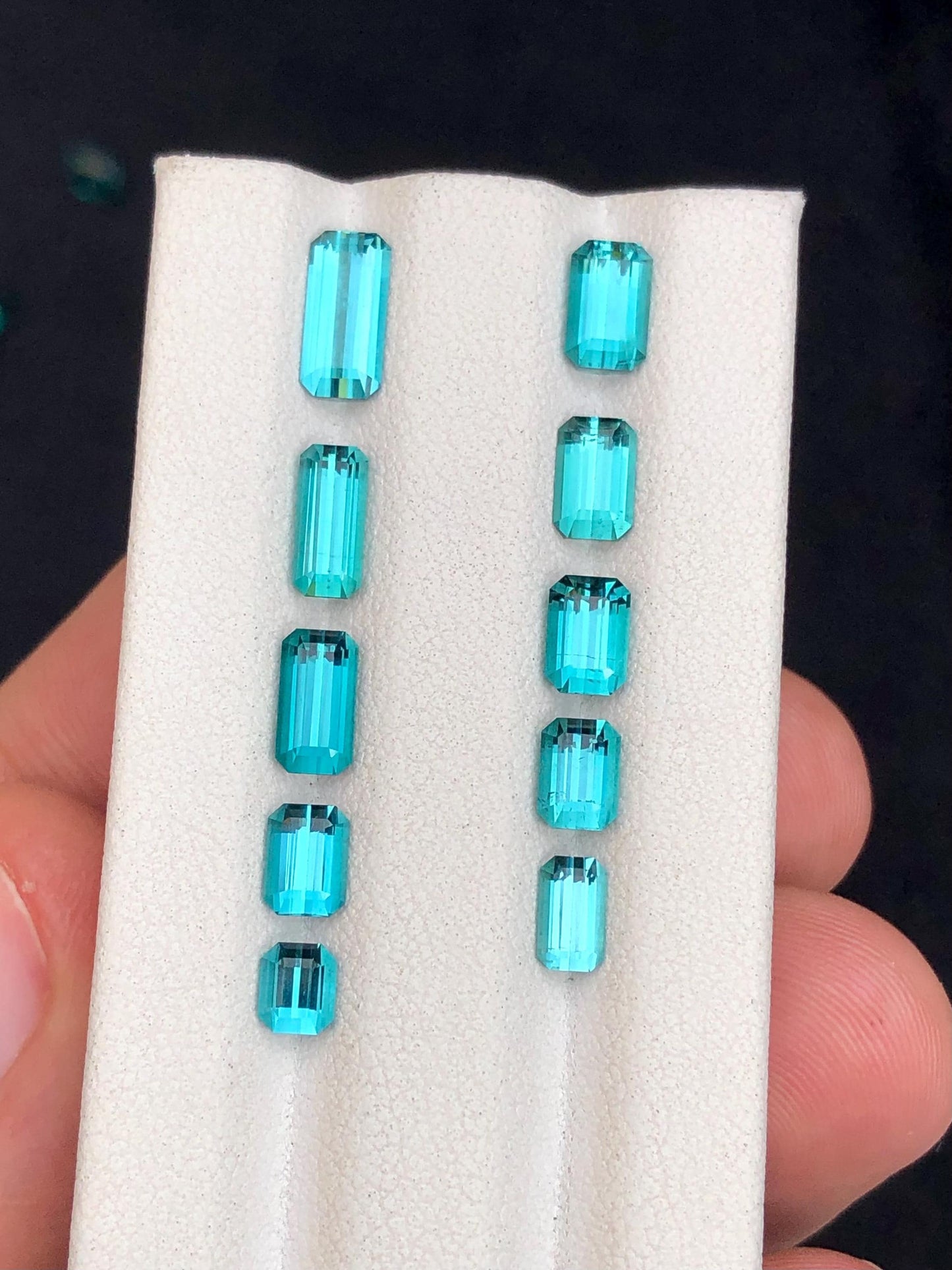 6.30 ct faceted neon blue tourmalines 4mm to 9mm