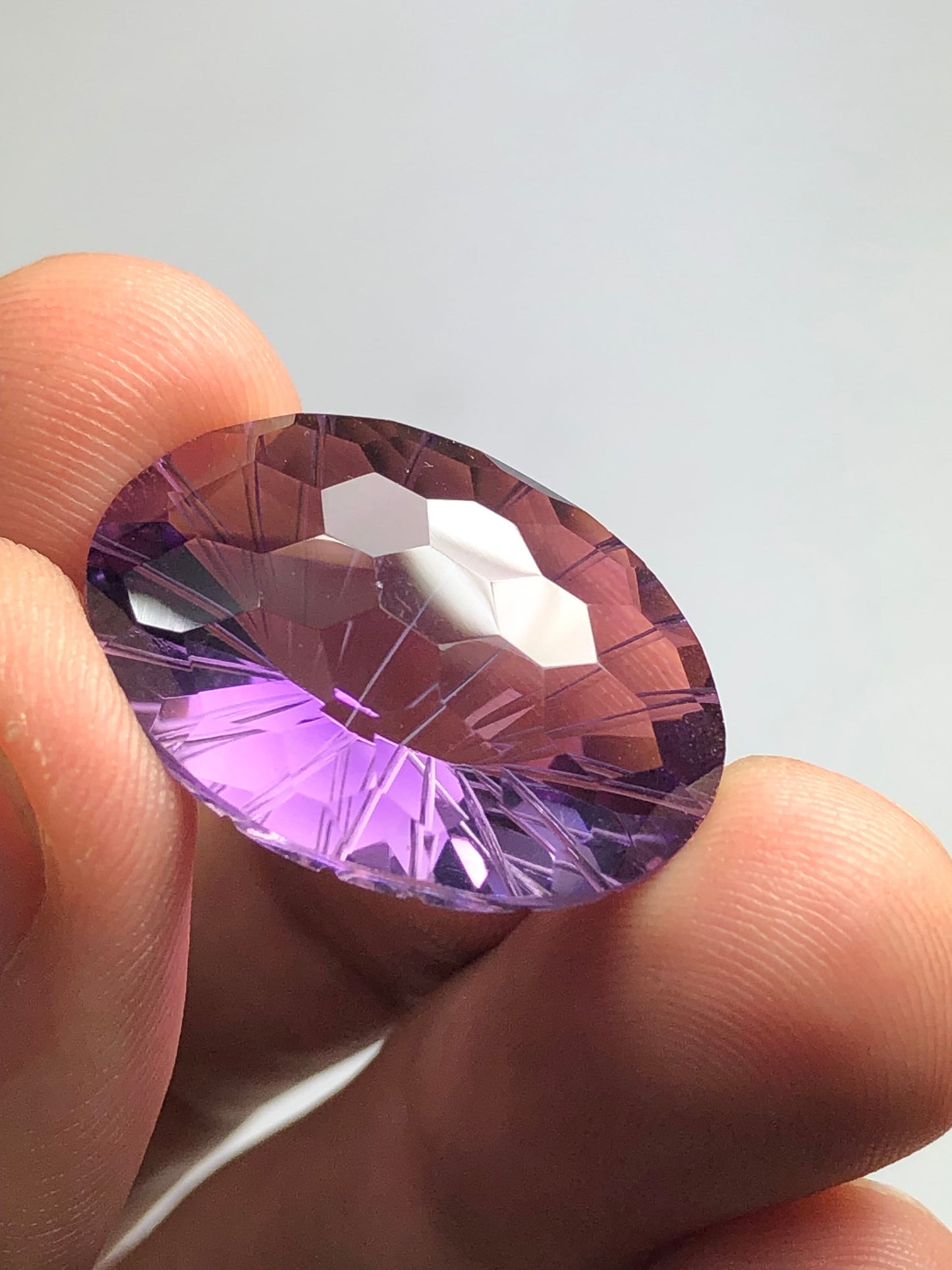 Natural amethyst 24.50 carat oval shape fancy cut